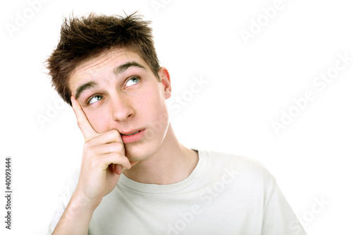 Photo: young man thinking young man thinking