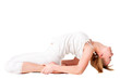 Photo: Young woman doing yoga exercise Young woman doing yoga exercise