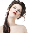 Beauty. Close-up beautiful female face with healthy long hairs.