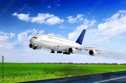 Photo: Modern airplane in Airport. Take off on runway. Modern airplane in Airport. Take off on runway.