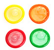 Colorful condoms isolated on white