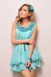 Beautiful blonde in blue dress,