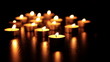 Many burning candles with shallow depth of field