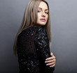 Young sensual & beauty woman in a fashionable dress.