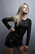 Young sensual & beauty woman in a fashionable dress.