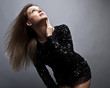 Young sensual & beauty woman in a fashionable dress.