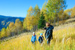 Family walk on autumn  mountain Nimchich pass