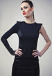 Perfect young woman with red lips.