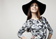 Romantic Beauty in black hat. Retro Style photo.