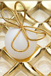 easter egg with golden ribbon easter egg with golden ribbon