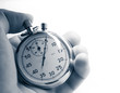 Hand holding stopwatch