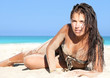 Young and sensual woman enjoying a sunny day on beach Young and sensual woman enjoying a sunny day on beach