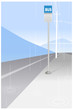 Bus stop sign and power pole
