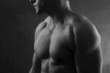 A young muscular man, in black and white