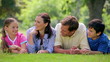 Family lying while chatting together