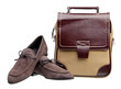 Pair of brown men loafers and messenger bag over white Pair of brown men loafers and messenger bag over white