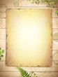 grunge burnt paper at wooden background