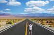 The enthusiastic tourist welcomes midday on great American road