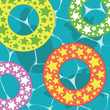 Ocean water scene with swimming turtles and floats