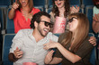 Photo: Laughing Couple In Theater Laughing Couple In Theater