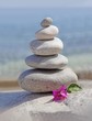 spa stones and flower on sea background