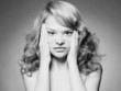 Woman stretching her face