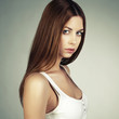 Fashion photo of a young woman with red hair