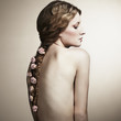 Portrait of a beautiful woman with flowers in her hair