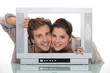 Couple inside a tv screen