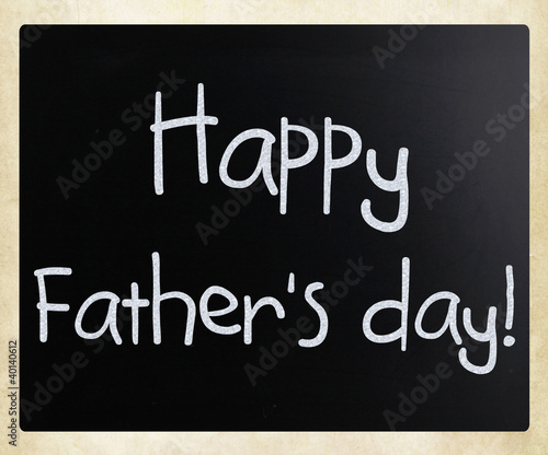 Illustration: "Happy father's day" handwritten with white chalk on a blackboar "Happy father's day" handwritten with white chalk on a blackboar