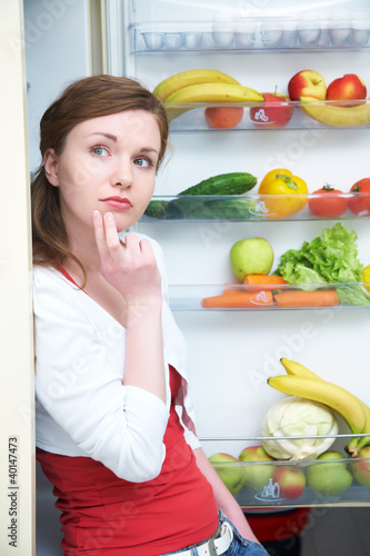 Photo: woman and fridge woman and fridge
