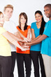 group of young multiracial people hands together