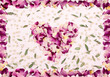 Heart shape made out of dired flower and petals Heart shape made out of dired flower and petals