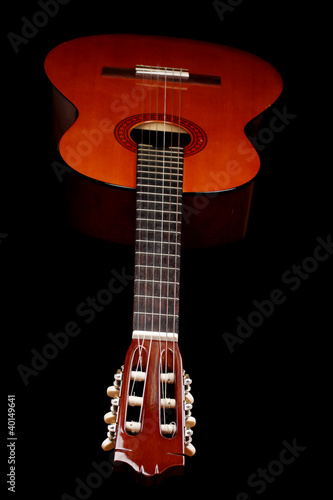 Photo: Guitar isolated on black Guitar isolated on black