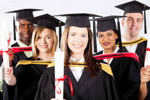 Photo: group of graduates in graduation gown and cap group of graduates in graduation gown and cap