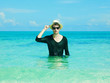 Stylish man in the sea Stylish man in the sea