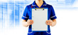 staff nurse holding clipboard