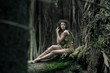 Eco woman lying on the trunk