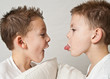 sticking tounge out twins