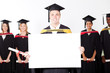 happy male graduate holding white board