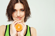 Beautiful woman with fresh juicy orange Beautiful woman with fresh juicy orange