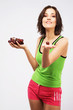 Beautiful woman holding a bunch of grapes Beautiful woman holding a bunch of grapes