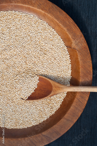 Photo: Wooden spoon and quinoa grains Wooden spoon and quinoa grains