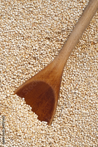 Photo: Wooden spoon and quinoa grains Wooden spoon and quinoa grains