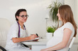 Pregnant woman and doctor.. Pregnant woman and doctor..