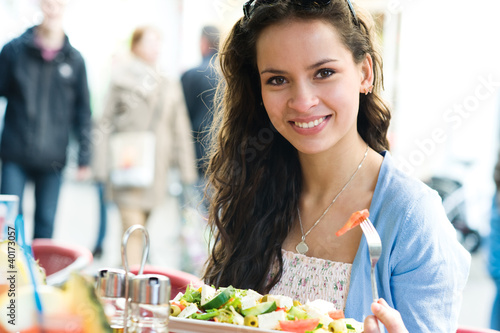 Photo: Young woman in cafe Young woman in cafe