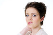 Woman thinking and biting her lips