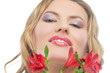 a little proud woman with vivid red fresh flowers