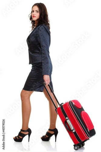 Photo: Full length young business woman to late red travel bagd Full length young business woman to late red travel bagd