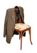 Green jacket hangs on a chair